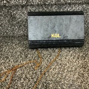 Kurt Geiger black hard shell gold chain purse
